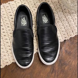 Women’s black leather vans